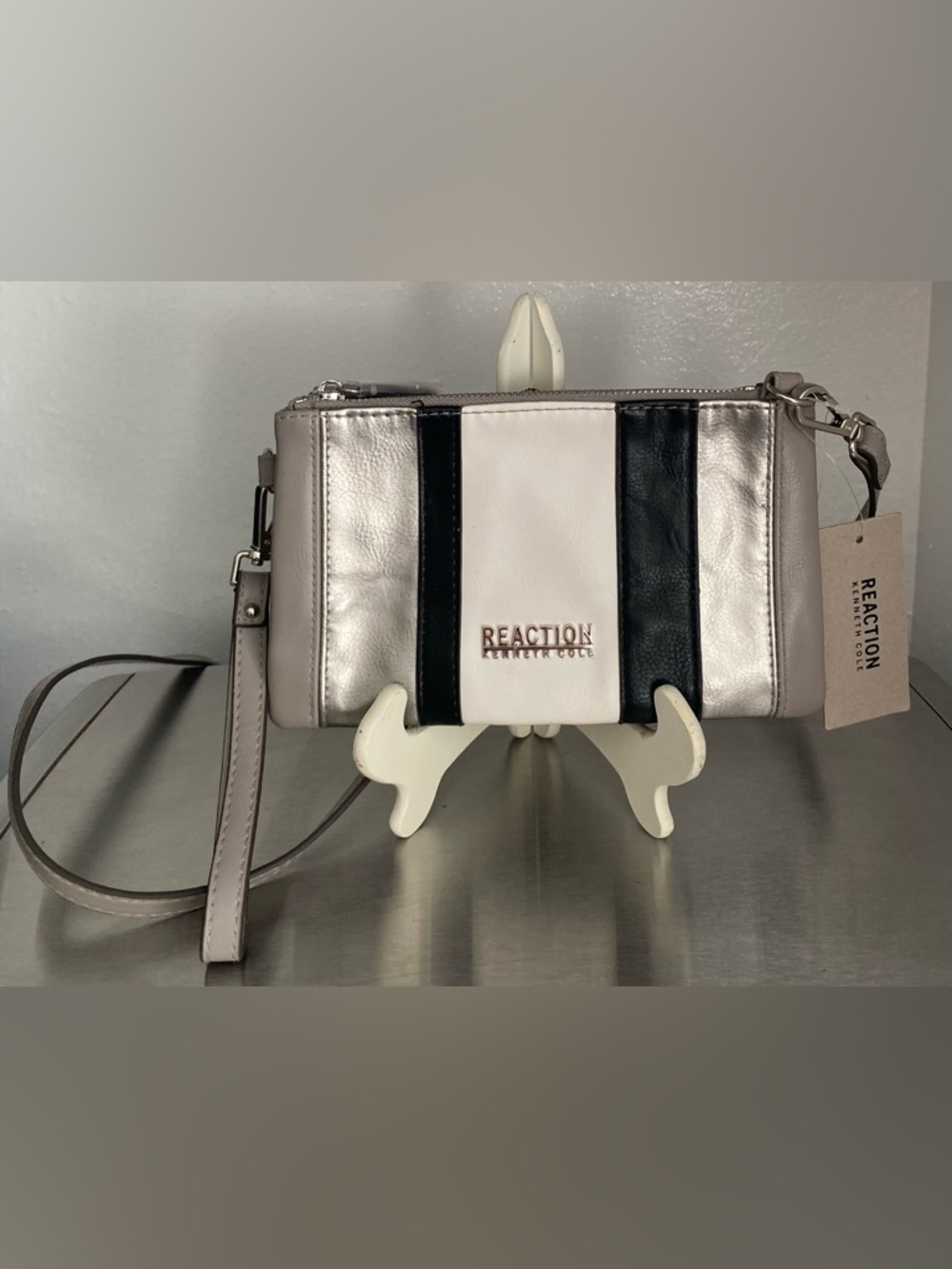 NEW KENNETH COLE REACTION CROSSBODY/WRISTLET IN SILVER BLACK AND WHITE